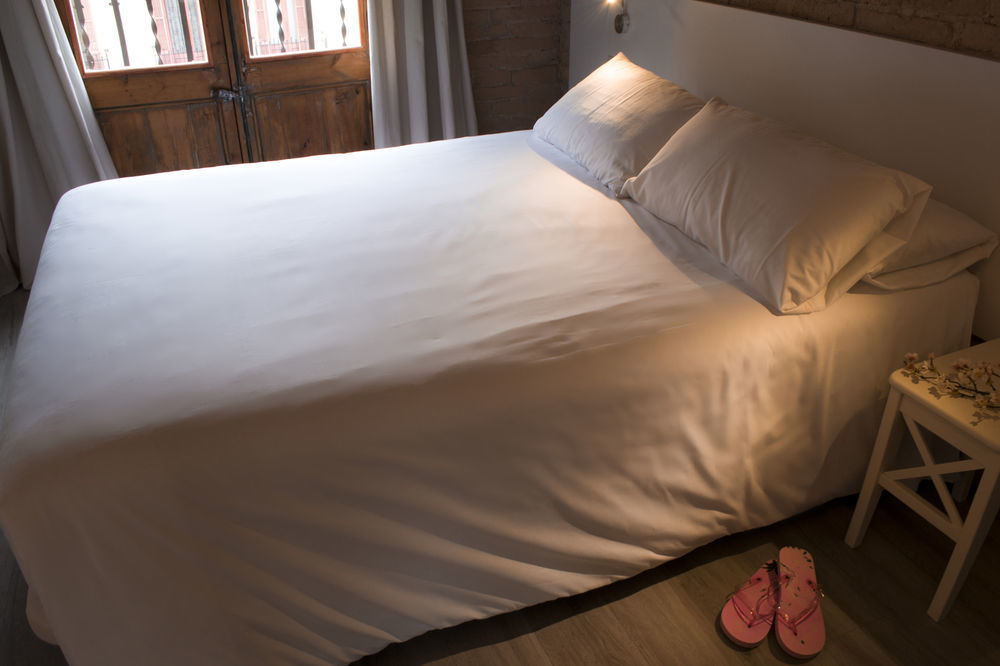 Happy People Sagrada Familia Gaudi Apartment บาร์เซโลนา ภายนอก รูปภาพ